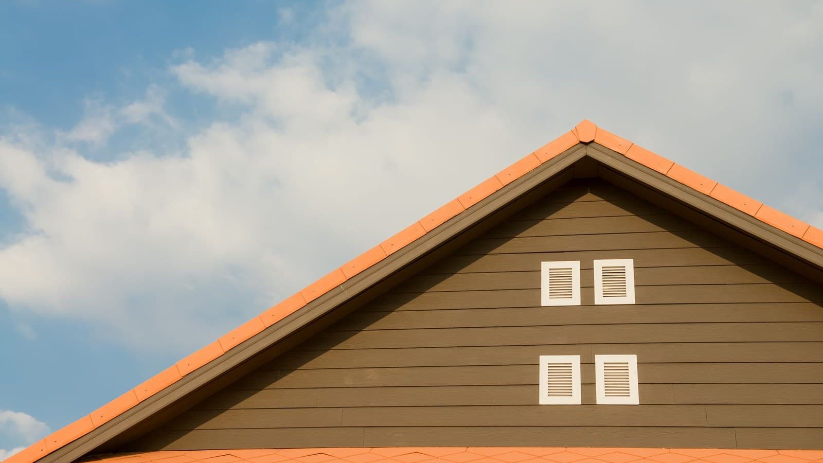 Roofline fascia and soffit detail beneath a gable